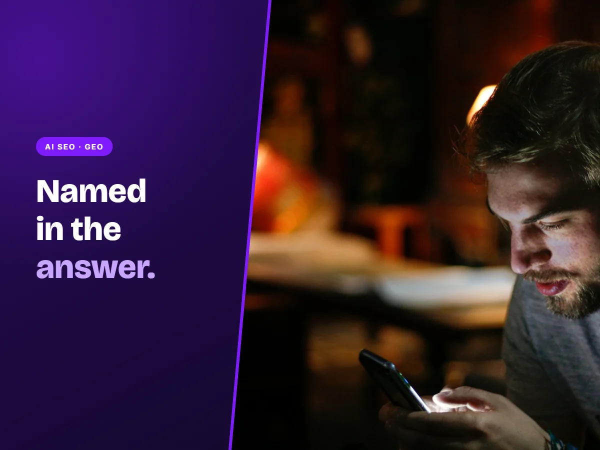 Man reading an AI answer on his phone, illustrating AI SEO and GEO services