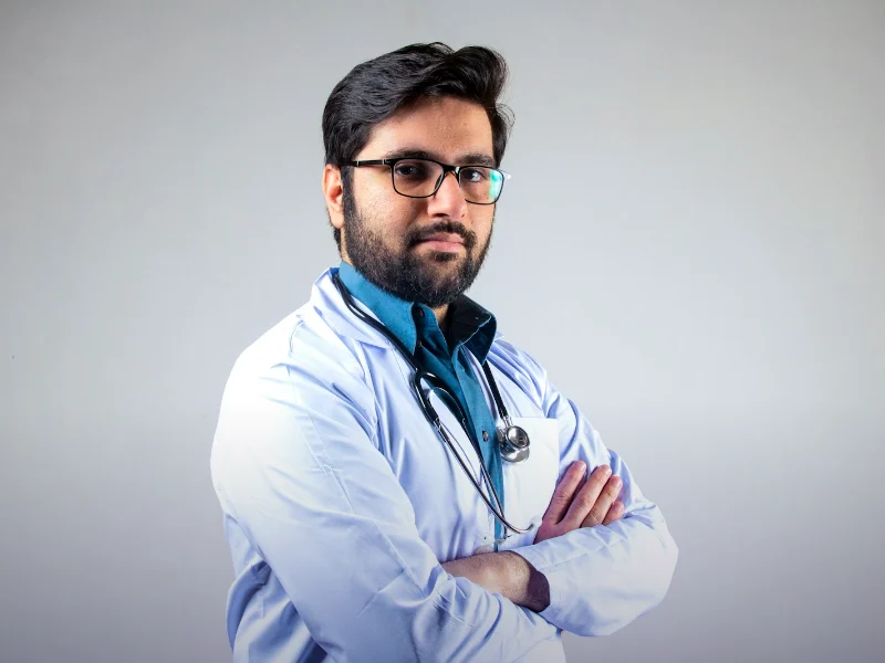 Doctor in a white coat representing SEO for clinics and hospitals in Faisalabad