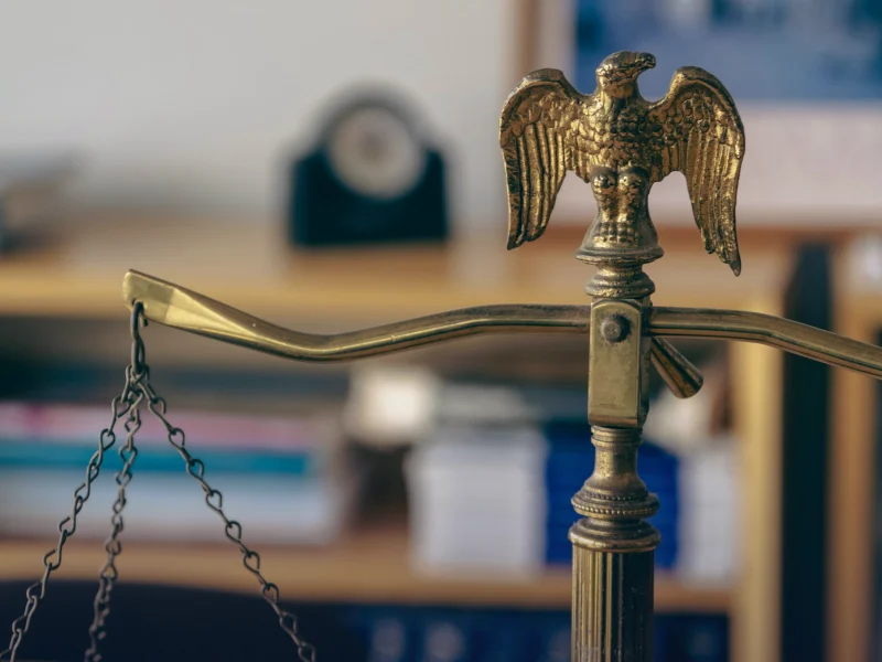 Brass scales of justice in a law office representing SEO for law firms in Islamabad