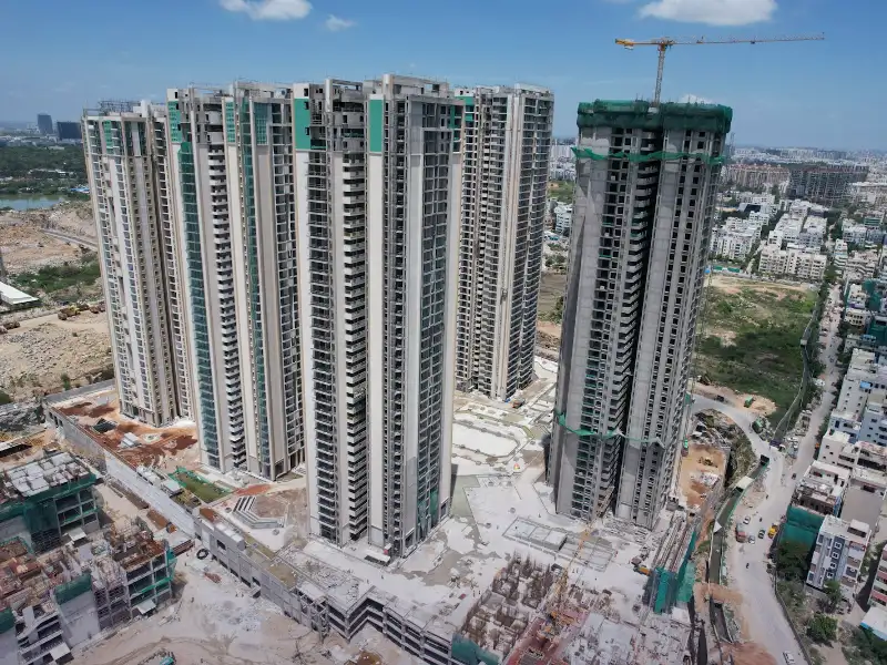 Residential towers under construction representing SEO for real estate developers in Lahore