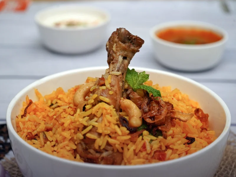 Bowl of rice and meat at a Karachi restaurant representing SEO for restaurants and caterers