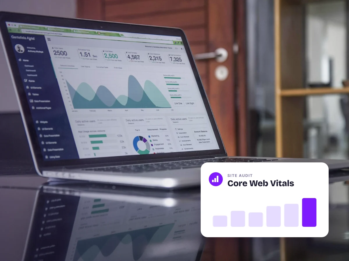 Laptop showing website analytics with a Core Web Vitals card, representing technical SEO audits